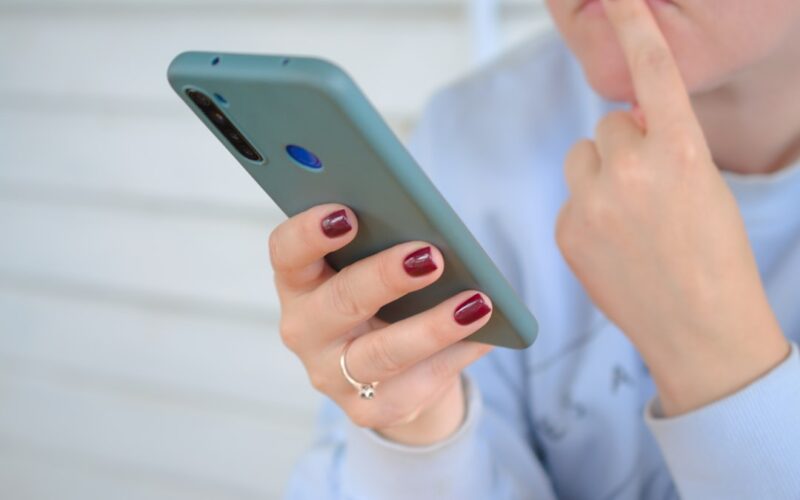 a person holding a cell phone
