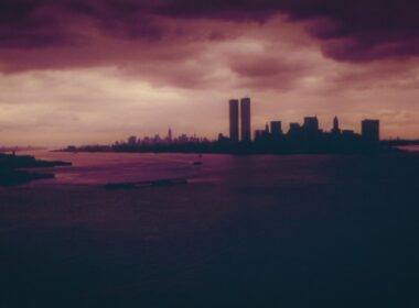 silhouette of buildings under dark sky