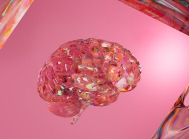 A close up of a pink object on a pink background