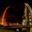 SpaceX Launches US Military X-37B Mini Shuttle for Eighth Mission, Testing Laser Communications and Quantum Navigation 6 urban photo of a white building by a lake