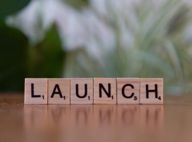 A scrabble block spelling out the word launch