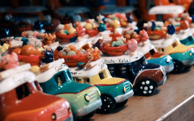 toy cars on wooden surface