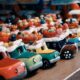 toy cars on wooden surface