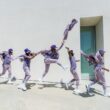 a group of people that are standing in the air