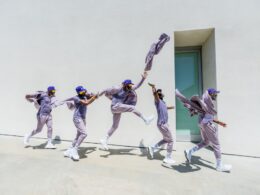 a group of people that are standing in the air