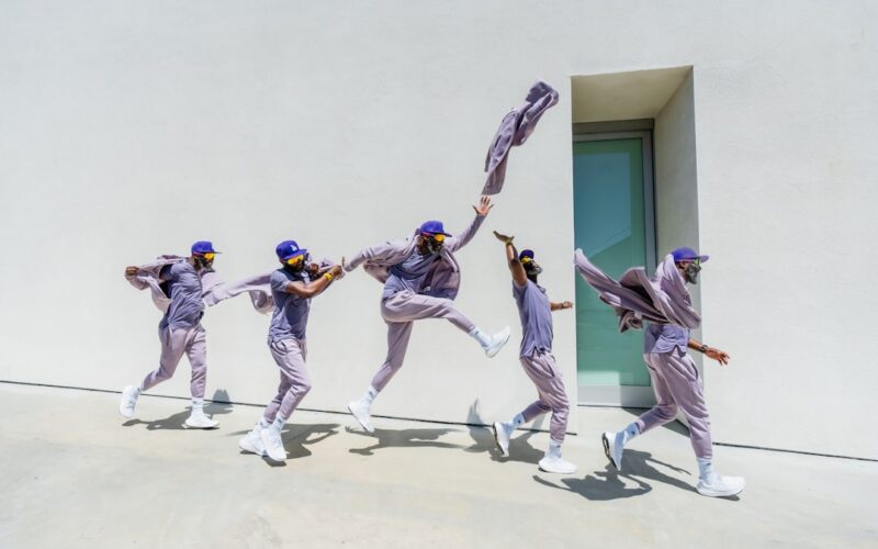 a group of people that are standing in the air