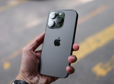 a person holding an iphone in their hand