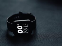a close up of a watch on a table