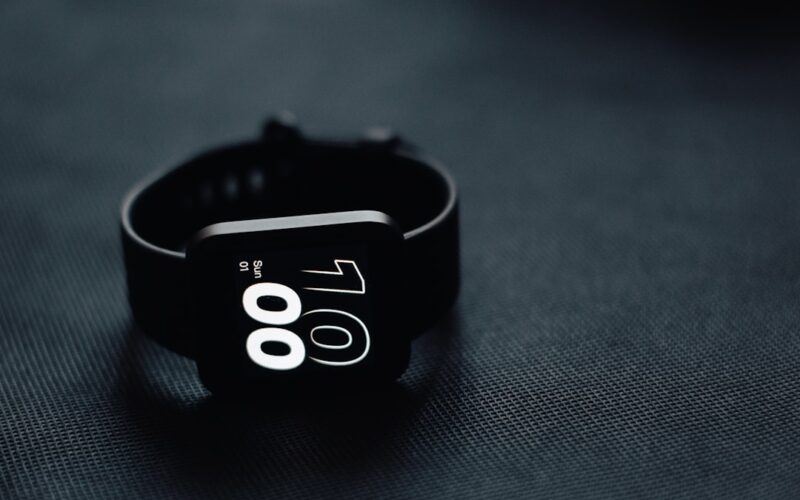 a close up of a watch on a table