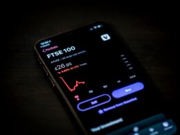 black android smartphone on brown wooden table