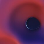 A close up of a purple and red object