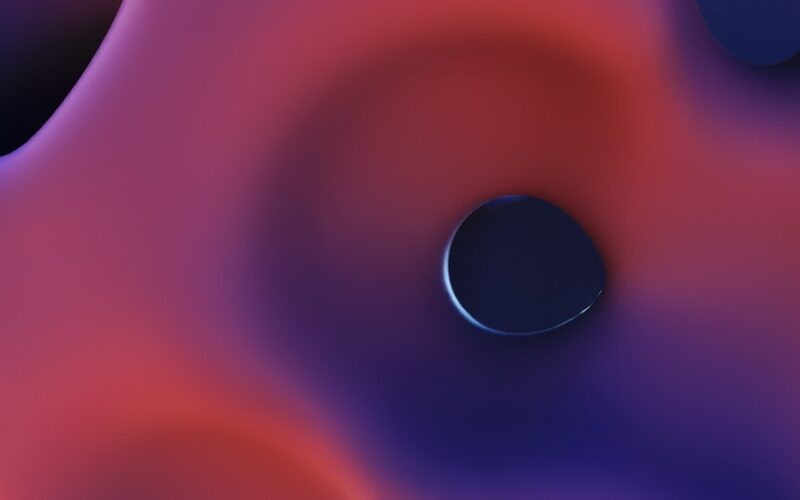 A close up of a purple and red object