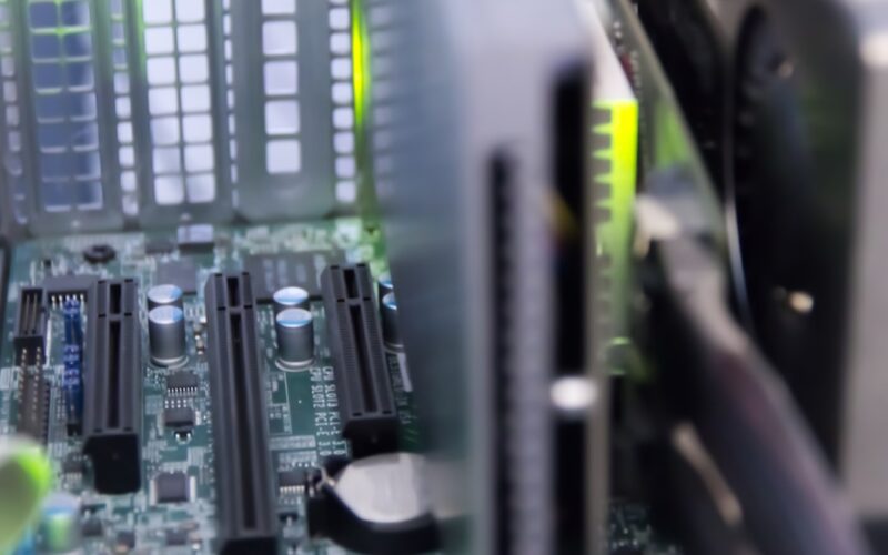 a close up of a computer motherboard with many components
