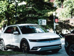 a white car parked on the side of the road