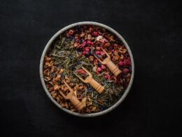 a bowl filled with various types of herbs