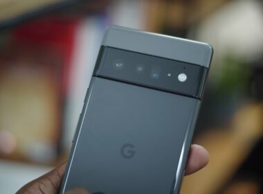 a hand holding a cell phone