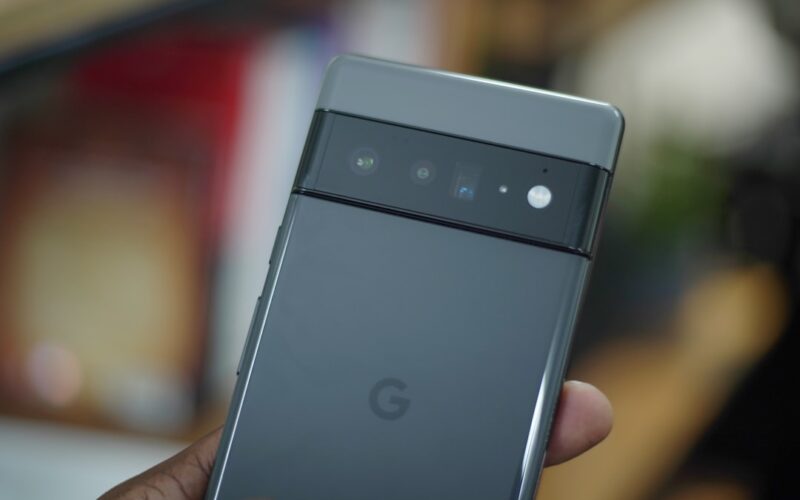 a hand holding a cell phone