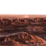 A view of a desert with rocks and sand