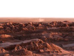 A view of a desert with rocks and sand