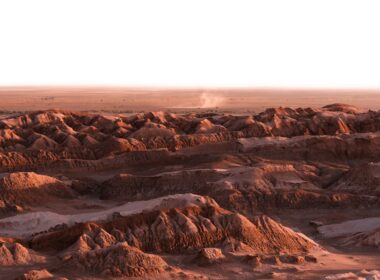 A view of a desert with rocks and sand