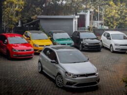 A group of cars parked in a parking lot