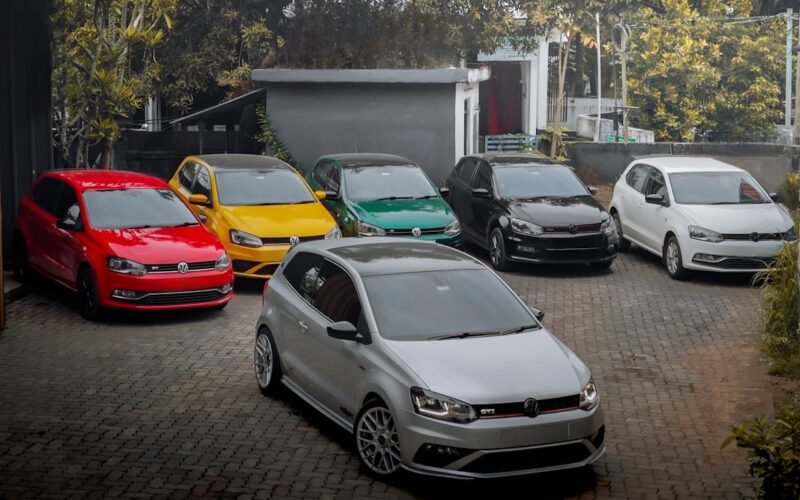 A group of cars parked in a parking lot