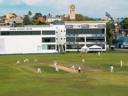 A cricket match is being played at the stadium.