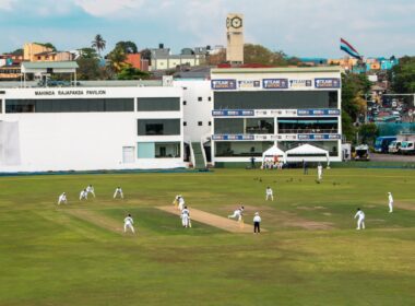 A cricket match is being played at the stadium.