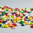 Tirzepatide Tops Semaglutide for Weight Loss: Zepbound and Wegovy Prices, Results, and Global Use in 2025 1 A pile of colorful candy corn on a white surface