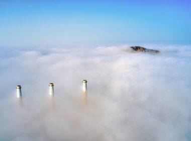 white clouds over white tower