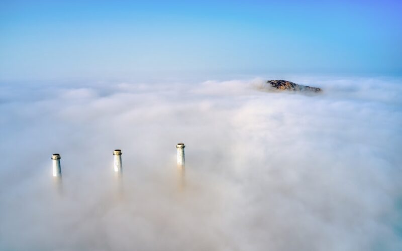 white clouds over white tower