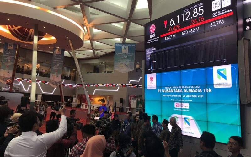 people in a building with lights