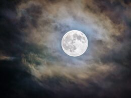 full moon and gray clouds during nighttime