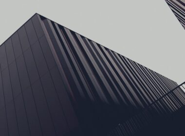 a couple of tall buildings next to each other