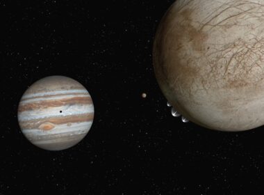 two planets are shown in the dark sky