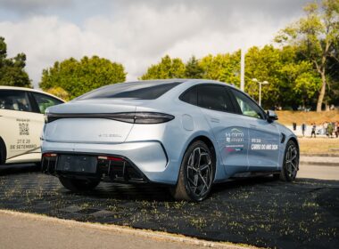 Two cars parked on the side of the road
