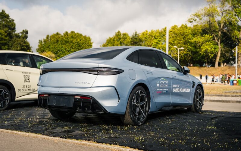 Two cars parked on the side of the road