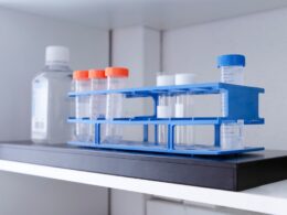 Test tubes and bottle on a shelf