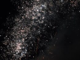 a bunch of fireworks are lit up in the night sky