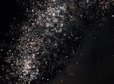 a bunch of fireworks are lit up in the night sky