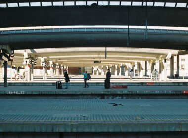 a group of people standing on top of a train platform