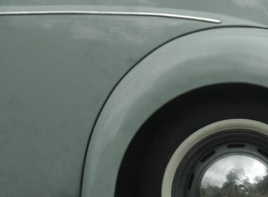 grey car with wheel and tire