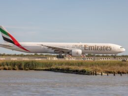 A large jetliner sitting on top of an airport runway