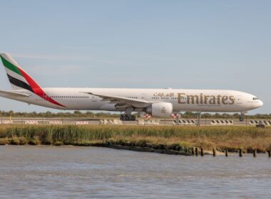 A large jetliner sitting on top of an airport runway