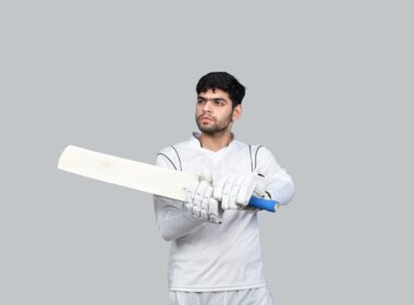 a man holding a white sword