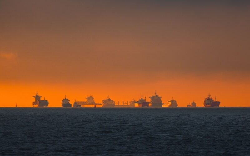 silhouette of city skyline during sunset