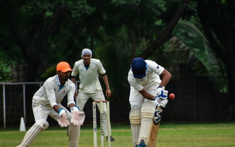 2 men playing golf during daytime