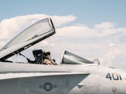 a couple of men in a jet