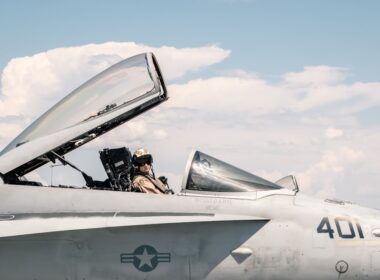 a couple of men in a jet