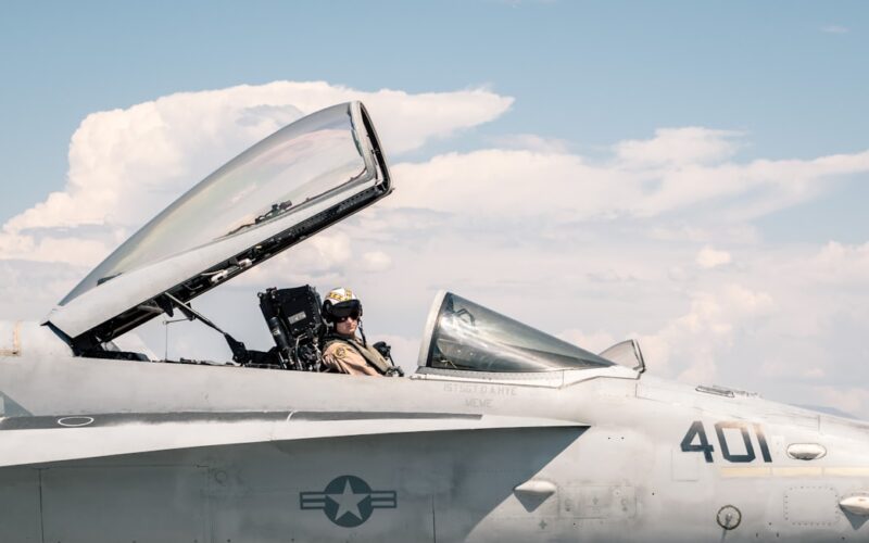 a couple of men in a jet